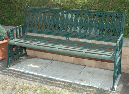 Appraisal: A VICTORIAN STYLE CAST IRON GARDEN BENCH