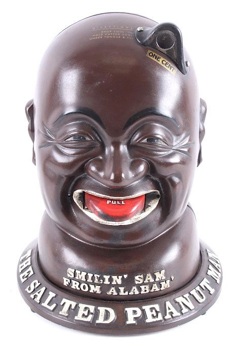 Appraisal: Smilin' Sam From Alabam' Coin-Op Peanut Dispenser Included in this