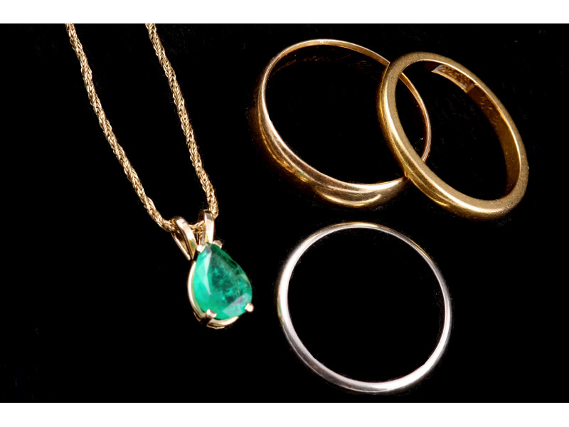 Appraisal: Emerald Pendant and Three Gold Bands One karat yellow gold