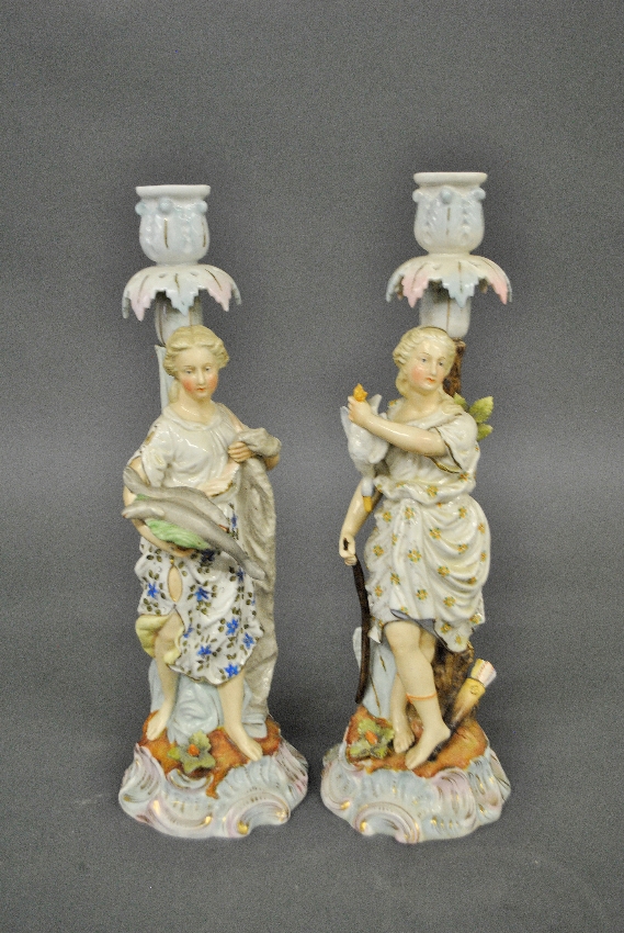 Appraisal: - Pair of German porcelain Sitzendorf figural candlesticks h -