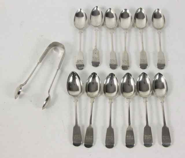 Appraisal: A set of twelve silver fiddle pattern teaspoons J W