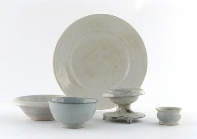 Appraisal: A collection of white glazed Delftware Comprising a rare salt