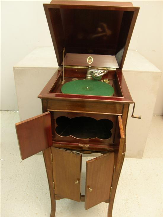 Appraisal: Early th century Commonwealth mahogany cased gramophone with a small