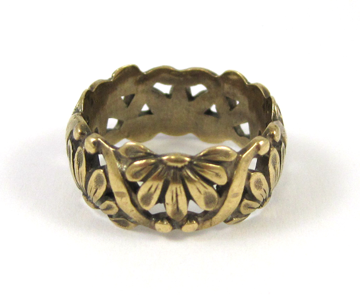 Appraisal: FOURTEEN KARAT YELLOW GOLD FLORAL ETERNITY BAND weighing grams and