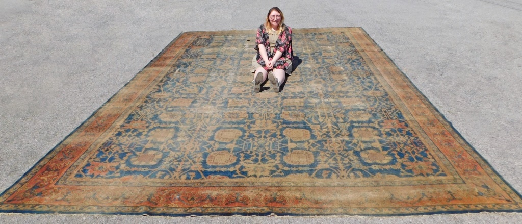 Appraisal: ANTIQUE OVERSIZE INDIAN LARISTAN RUG India Early th Century Red