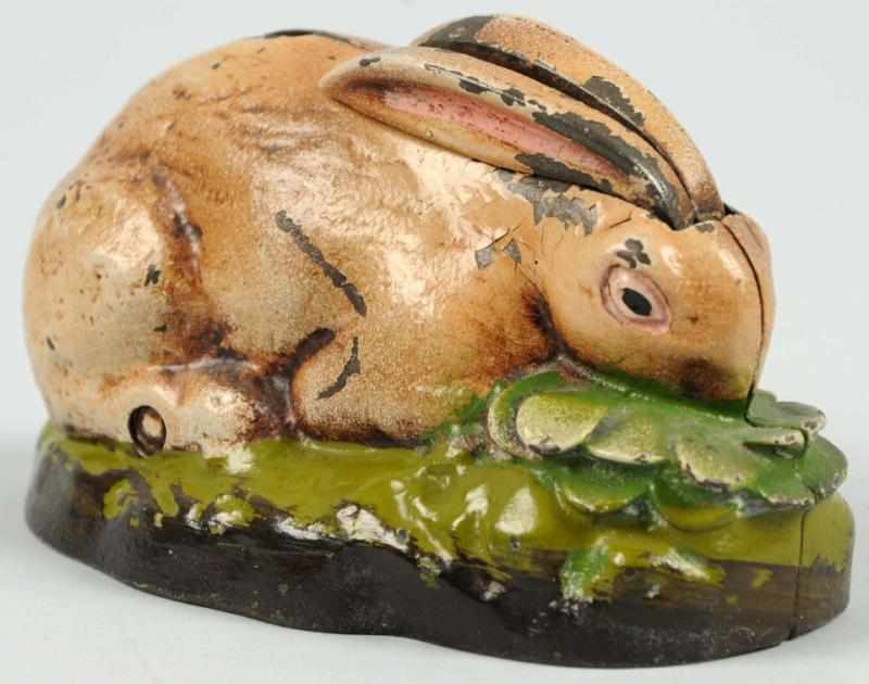 Appraisal: Cast Iron Rabbit Eating Cabbage Mechanical Bank Manufactured by Kilgore