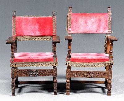 Appraisal: Two similar French Baroque walnut armchairs each with acanthus carved