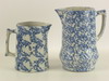 Appraisal: PITCHERS - Lot of two th C blue decorated stoneware