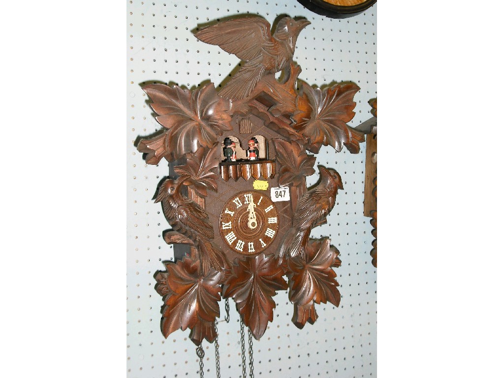 Appraisal: Contemporary Black Forest cuckoo clock the dial within a chalet