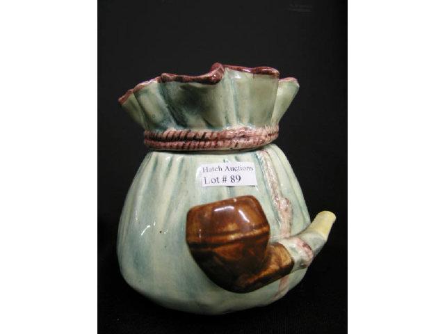 Appraisal: Victorian Figural Majolica Pottery Tobacco Jar sack with pipe on