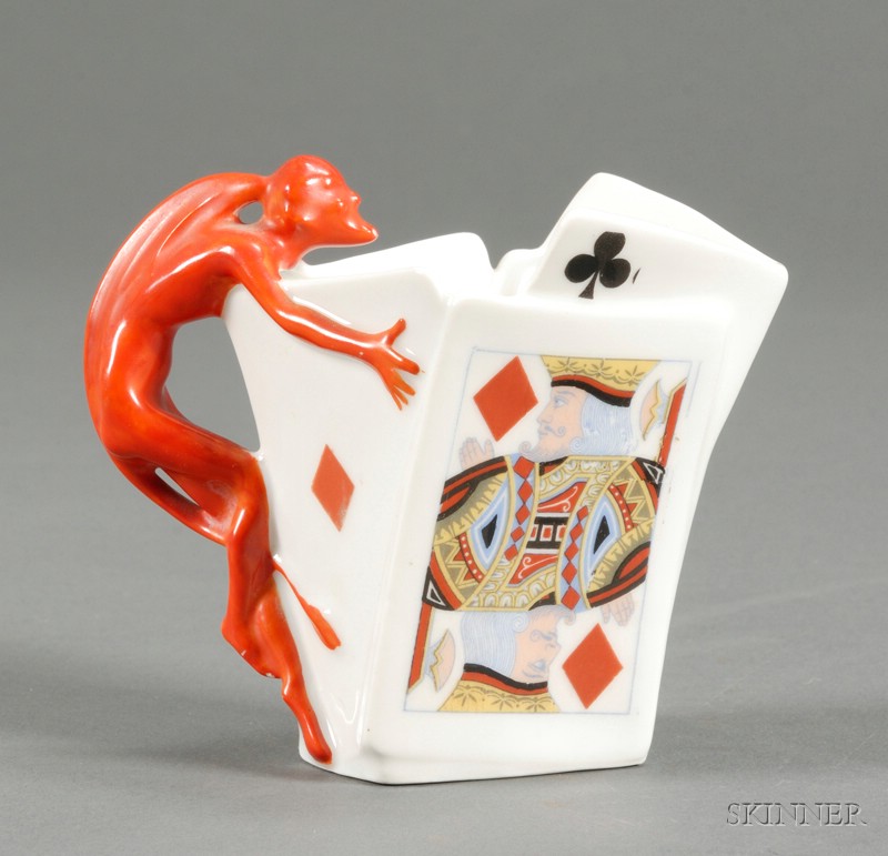 Appraisal: Royal Bayreuth Devil and Cards Creamer Porcelain Bavaria early th