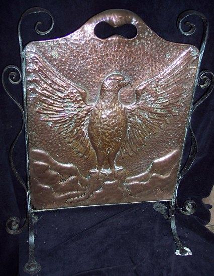 Appraisal: A Victorian copper firescreen embossed an eagle with outstretched wings