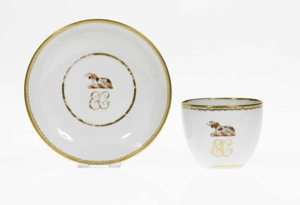 Appraisal: A DERBY CRESTED TEACUP AND SAUCER of bute shape enamelled