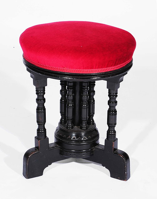 Appraisal: A Gillows ebonised stool th Century with turned column supports