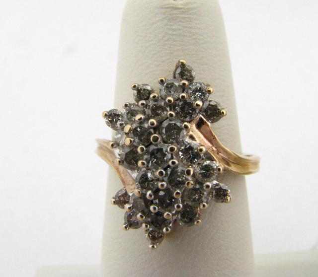 Appraisal: K yellow gold diamond cluster ring with diamonds approximately ctw