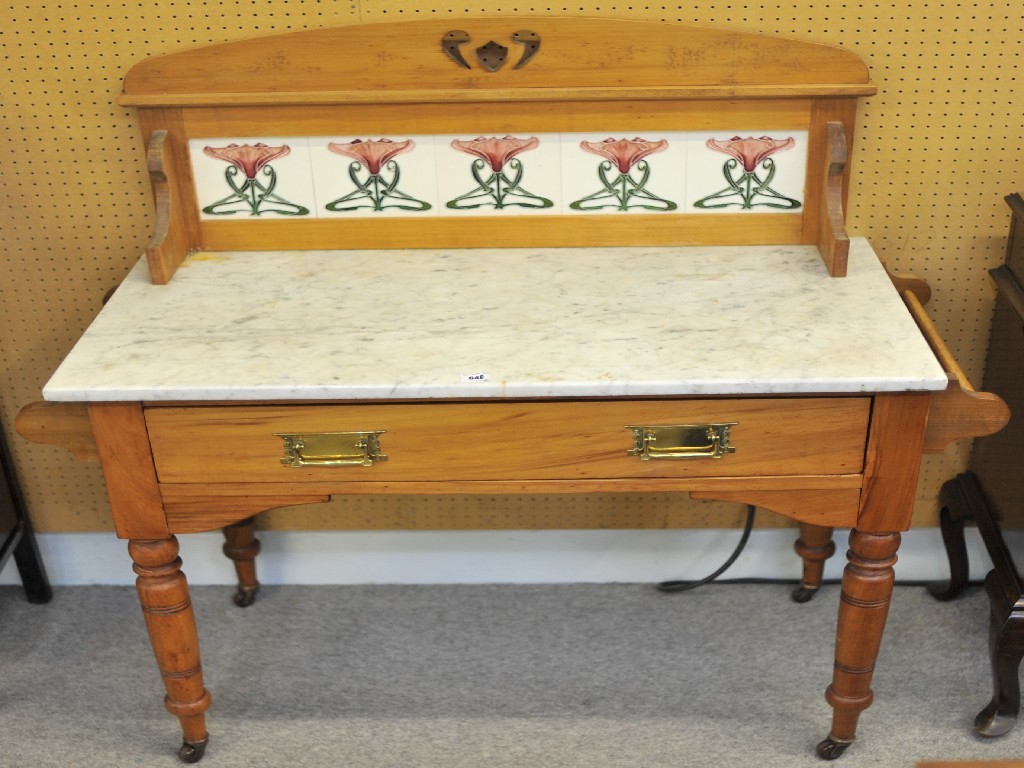 Appraisal: Victorian pine washstand with Art Nouveau tiled back and marble