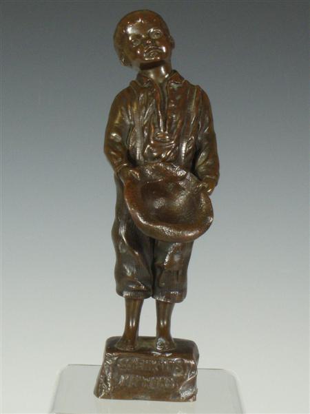 Appraisal: A bronze figure of a boy After H Gebhardt the