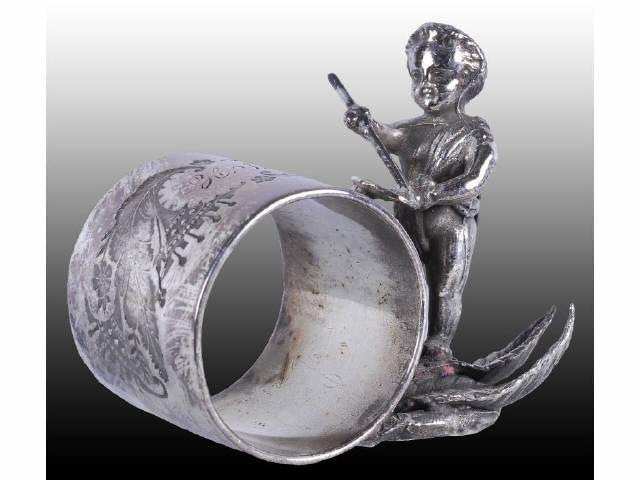 Appraisal: Draped Cherub Artist Figural Napkin Ring Description Cherub stands on