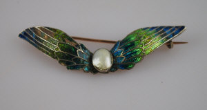 Appraisal: Art Nouveau blue and green enamel winged brooch having river