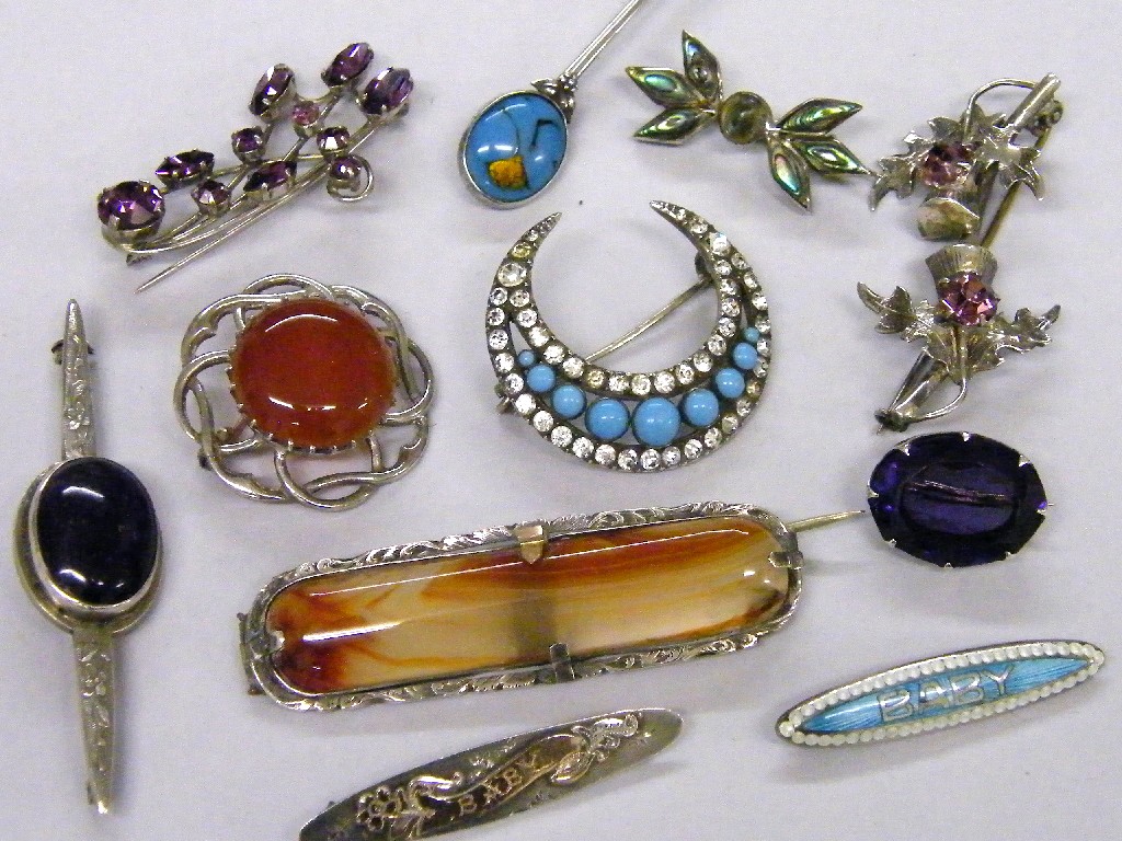 Appraisal: Selection of mainly silver stone set brooches