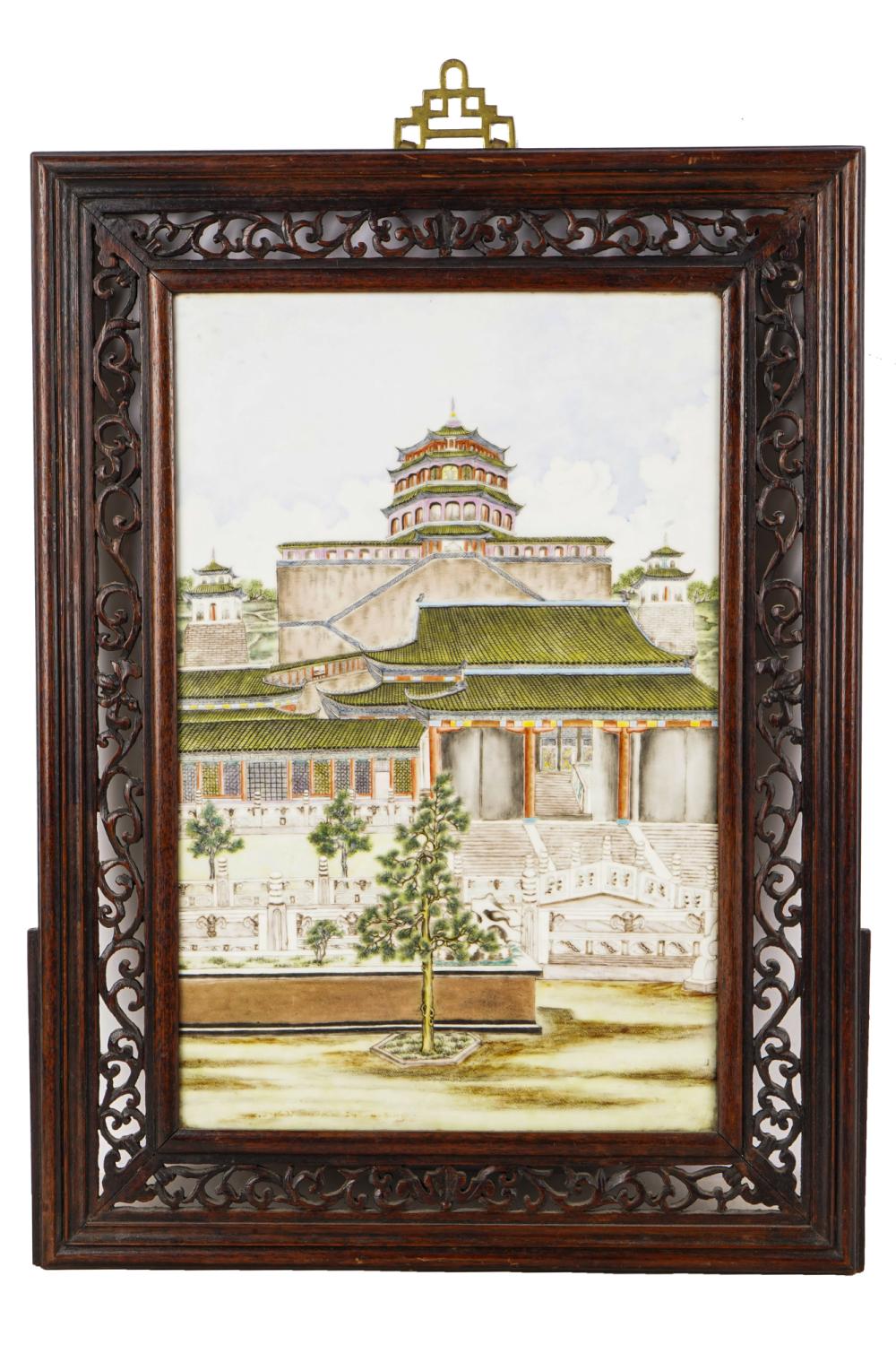 Appraisal: CHINESE EXPORT PAINTED PORCELAIN PLAQUEin a reticulated wood frame x