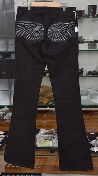 Appraisal: A PAIR OF JEANS BY ALEXANDER McQUEEN SIZE