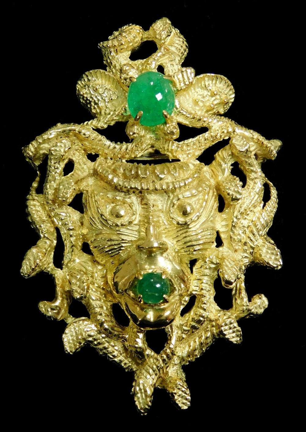 Appraisal: JEWELRY Tested K yellow gold Emerald sculpted head brooch with