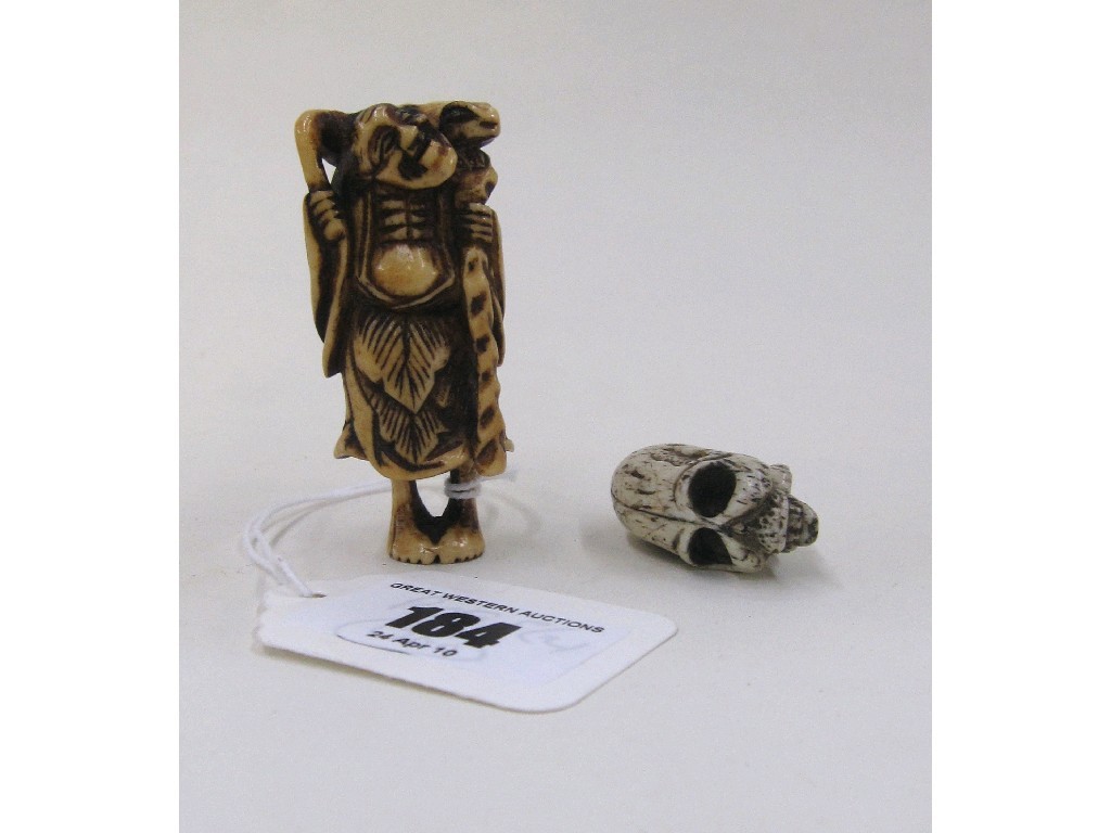 Appraisal: Lot comprising two netsuke - man with large toad and