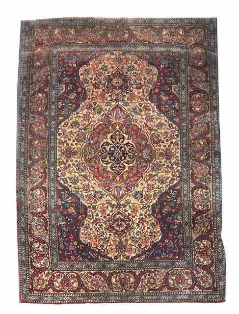 Appraisal: AN OLD PERSIAN SAROUK RUG decorated a central floral white