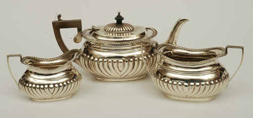 Appraisal: A THREE PIECE STERLING SILVER TEA SERVICE Early th century