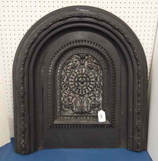 Appraisal: Early cast iron fireplace surround with insert '' W ''