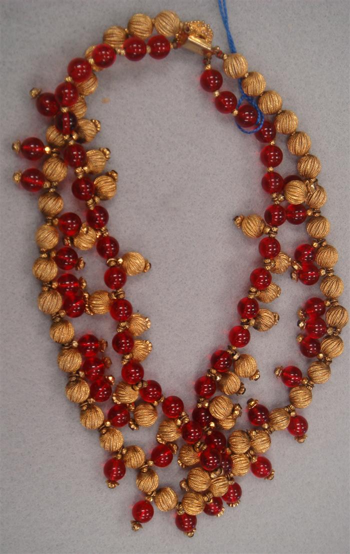 Appraisal: Vogue' two strand necklace featuring red glass beads along with