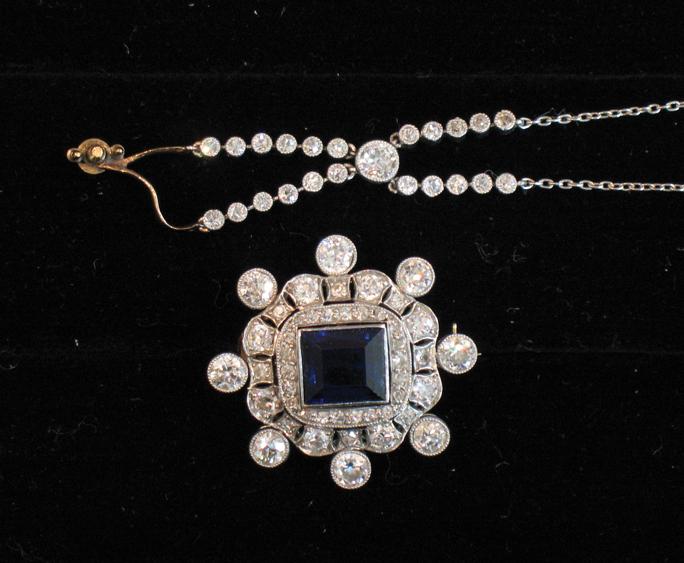 Appraisal: AN ART DECO STYLE SAPPHIRE AND DIAMOND BROOCH PENDANT the