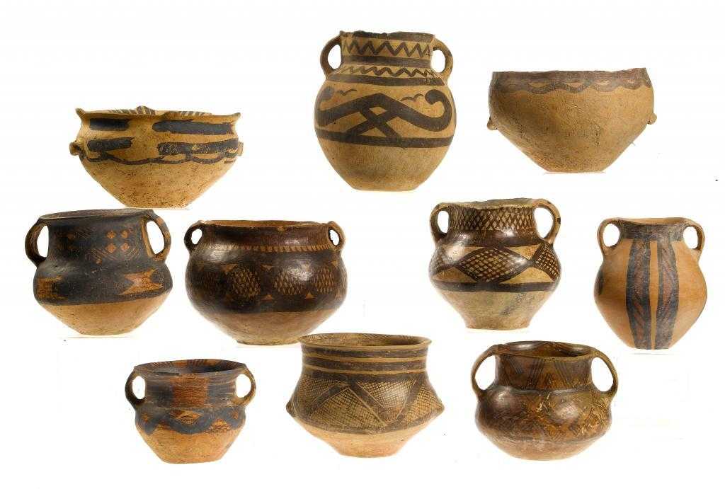 Appraisal: TEN NEOLITHIC EARTHENWARE JARS of buff coloured ware with loop