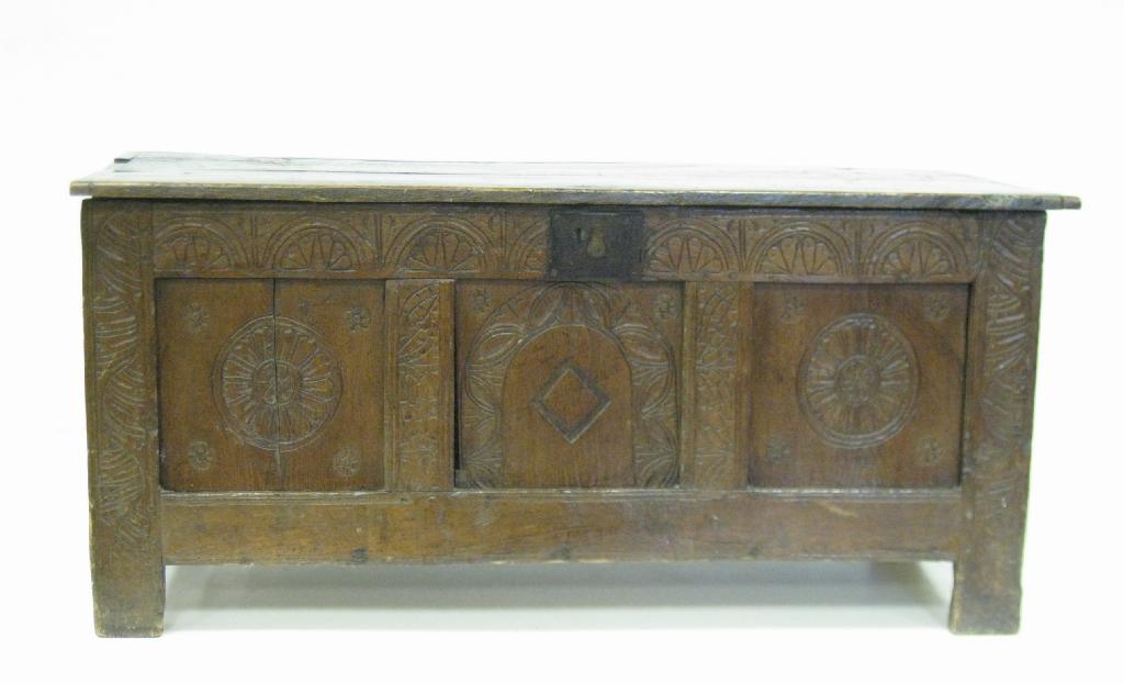 Appraisal: An antique oak Coffer triple carved front