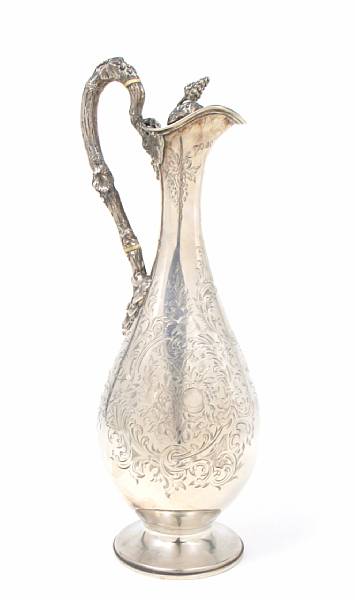 Appraisal: A Victorian silver claret jugWilliam Holmes London Of elongated bottle