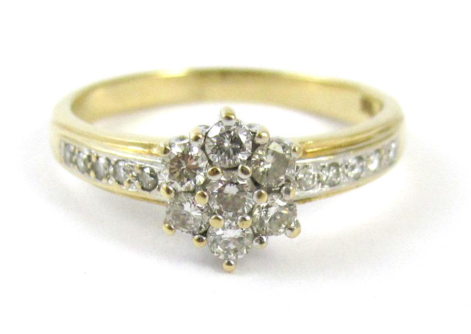 Appraisal: DIAMOND AND FOURTEEN KARAT GOLD RING set with round-cut diamonds