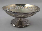 Appraisal: A sterling silver bowl on spread cast foot with pierced