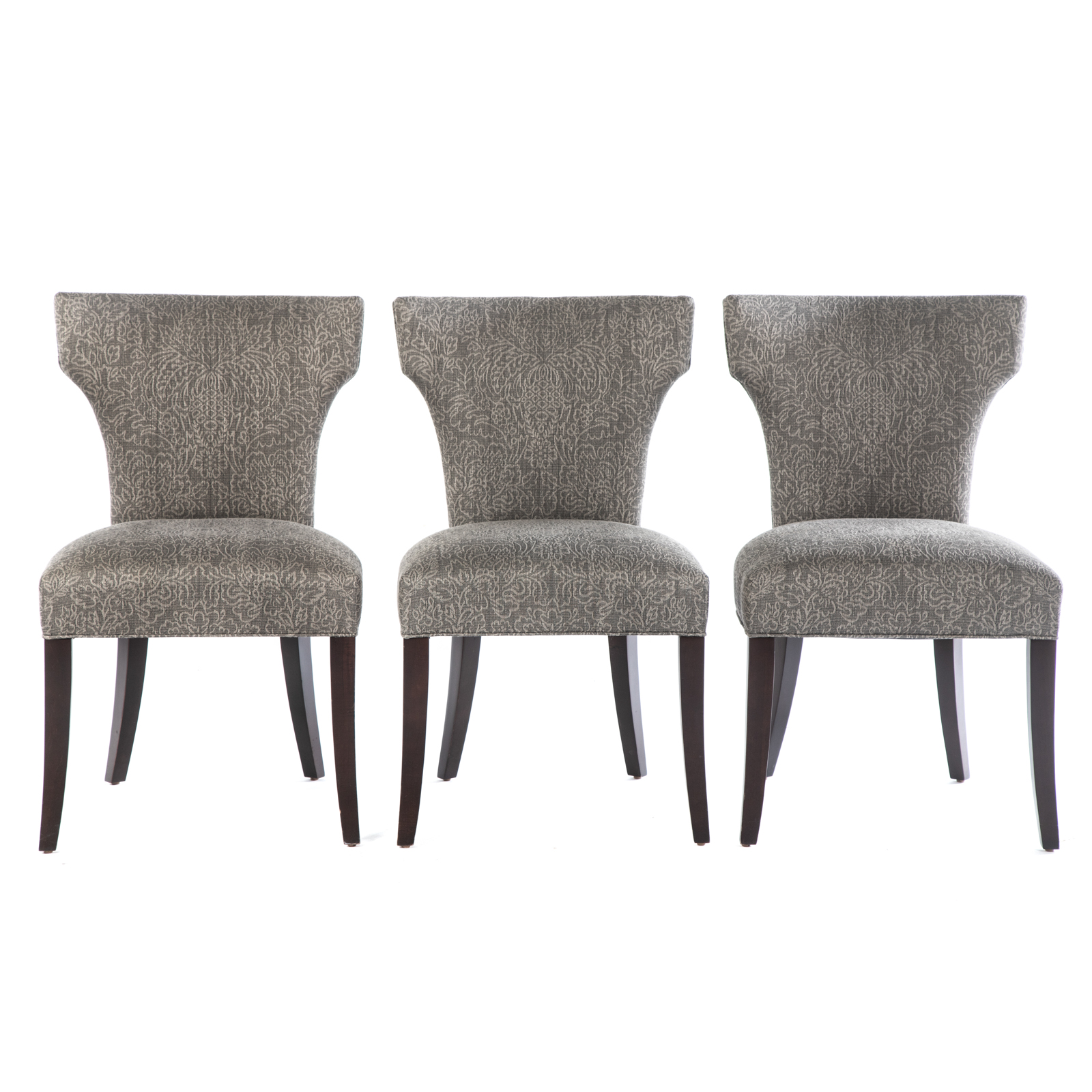 Appraisal: THREE CONTEMPORARY CRATE BARREL UPH CHAIRS With shaped backs in