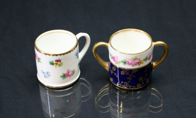 Appraisal: A Royal Doulton miniature mug and a loving cup each