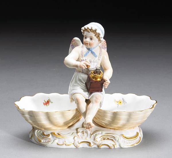 Appraisal: A pair of Meissen porcelain figural sweetmeats Each Cupid disguised