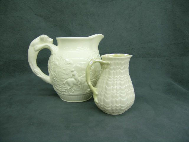 Appraisal: Wedgwood scenic white pitcher with embossed hut scene and dog