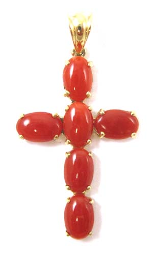 Appraisal: CORAL AND FOURTEEN KARAT GOLD CROSS having oval cabochons and