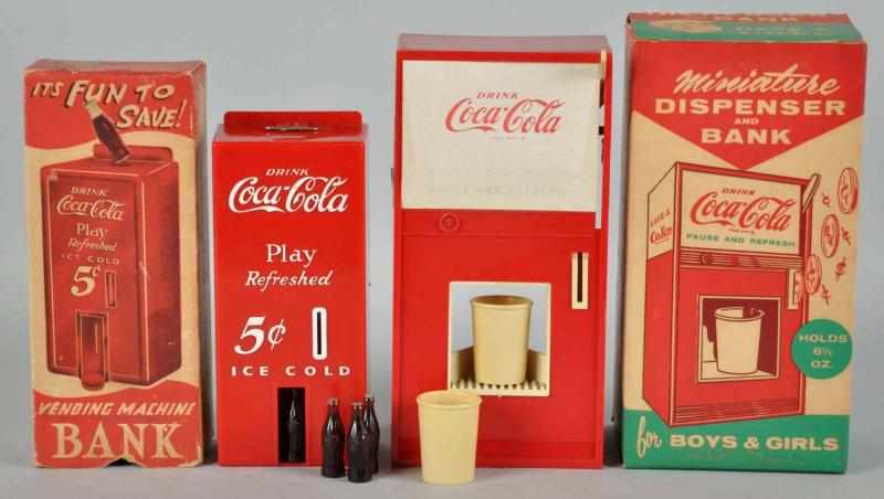 Appraisal: Lot of Coca-Cola Toy Banks Description s Both are clean