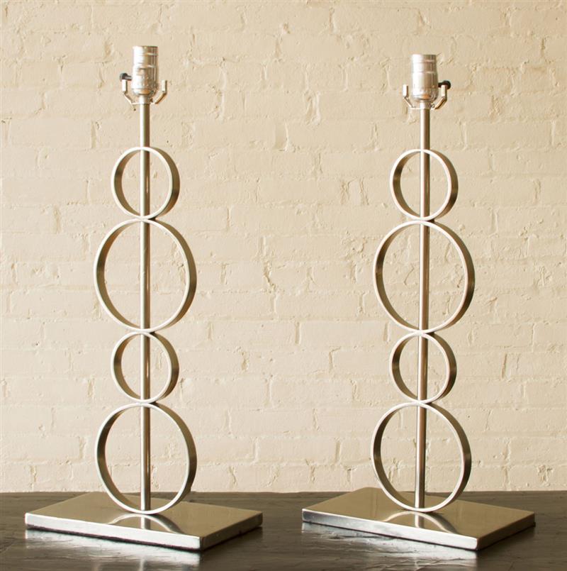 Appraisal: PAIR OF CONTEMPORARY POLISHED METAL TABLE LAMPS OF RECENT MANUFACTURE