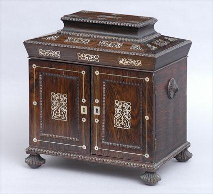 Appraisal: VICTORIAN MOTHER-OF-PEARL INLAID ROSEWOOD SEWING CABINET The flat-domed hinged top