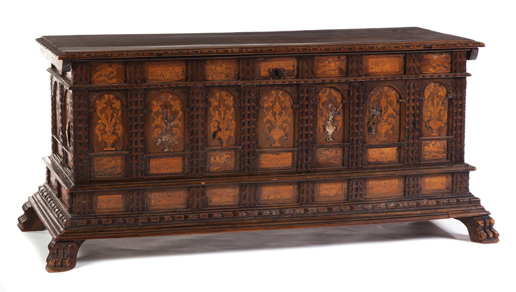 Appraisal: ORNATELY CARVED AND INLAID BLANKET CHEST European mid th century