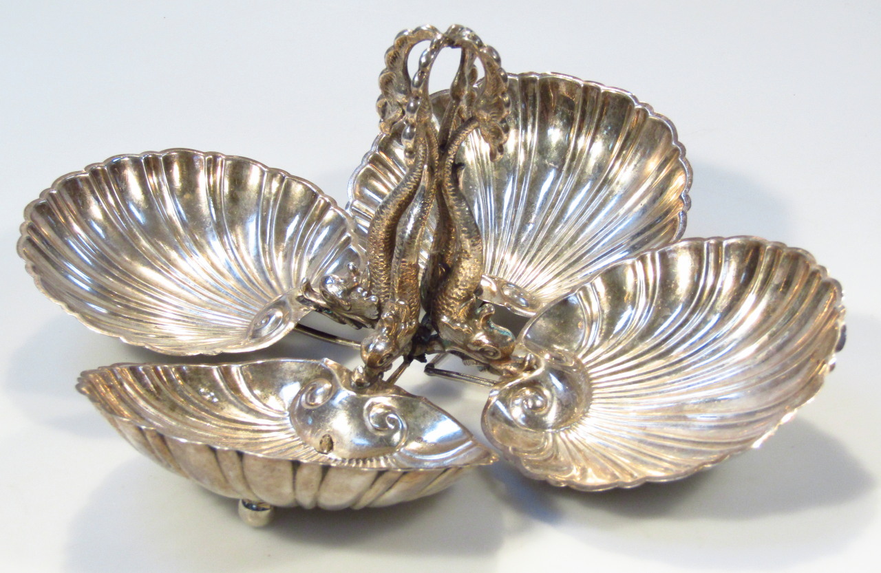 Appraisal: A late thC silver plated serving dish with four shell