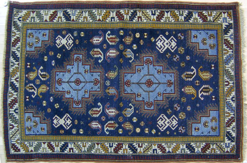 Appraisal: Shirvan throw rug early th c with medallions on a