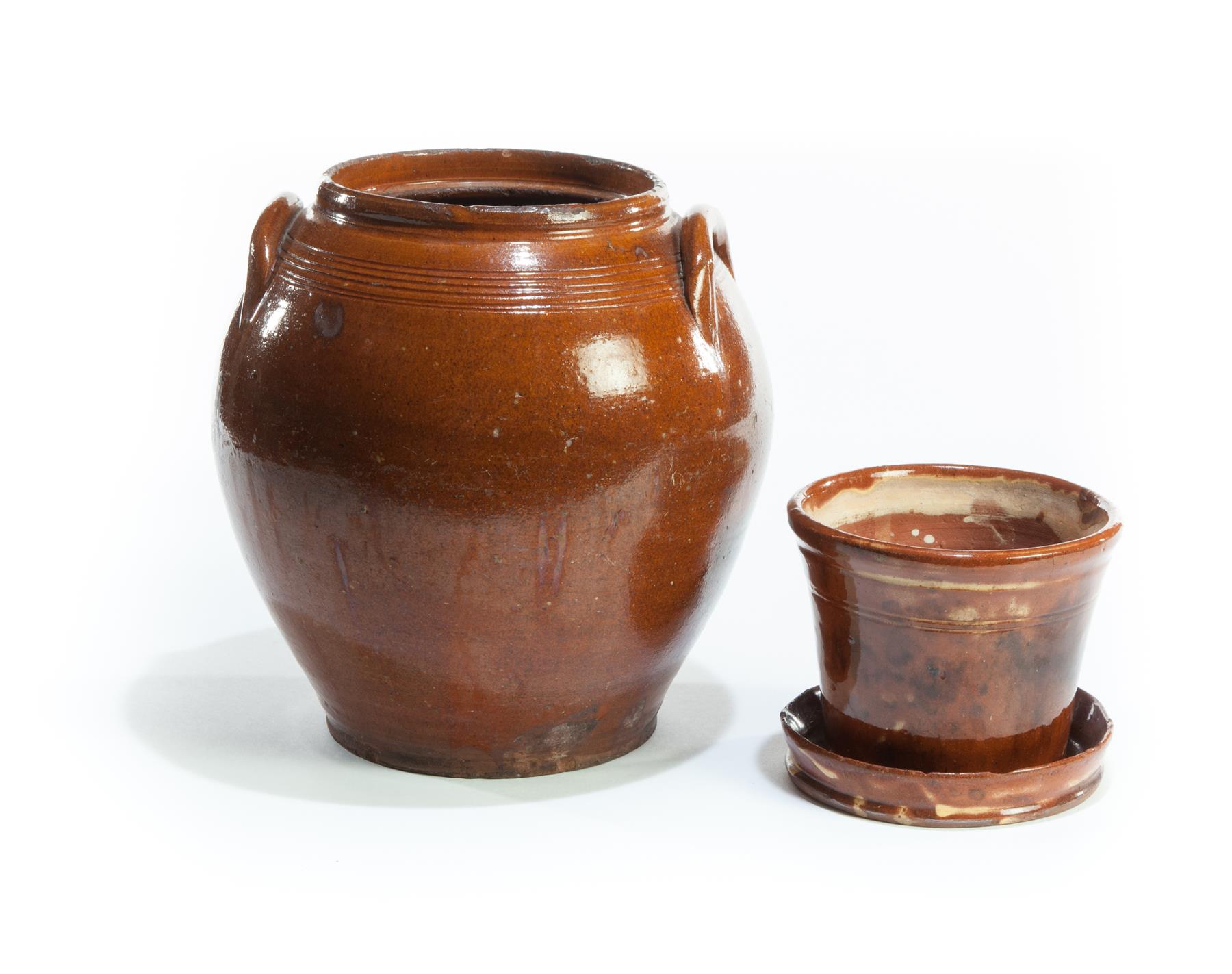 Appraisal: TWO PIECES OF AMERICAN REDWARE Nineteenth century Flower pot with